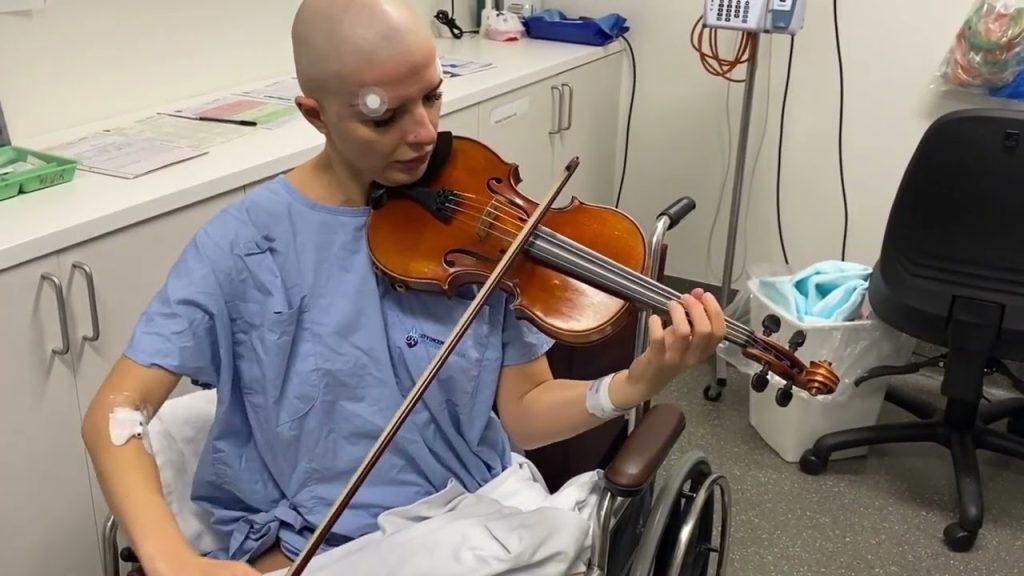 Violinist Ella Laskova undergoing treatment for focal hand dystonia